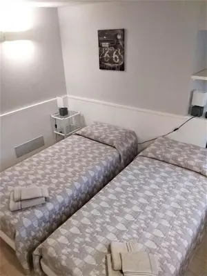 Letto o letti in una camera di La Casa di Tommy