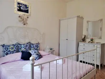 Letto o letti in una camera di Villa Chanel