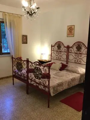 Letto o letti in una camera di Villa Chanel