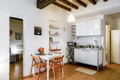 Cucina o angolo cottura di GuestHost - Borgo della Posta Monolocale in Centro