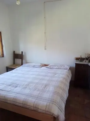 Letto o letti in una camera di Al Mostarolo