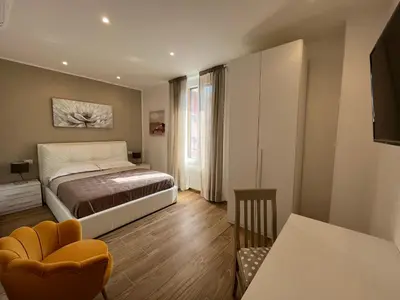 Letto o letti in una camera di LEVANTE Central Rooms