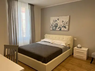 Letto o letti in una camera di LEVANTE Central Rooms