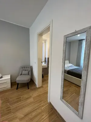 Letto o letti in una camera di LEVANTE Central Rooms