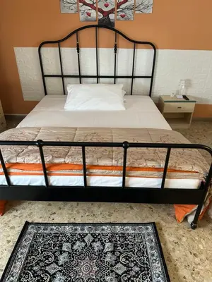 Letto o letti in una camera di La Casa di Jennifer