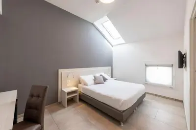 Letto o letti in una camera di Hotel Vecchio Casello