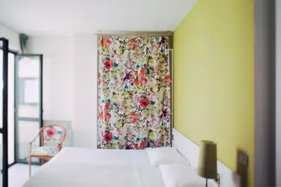 Letto o letti in una camera di Hotel Elite
