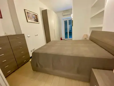 Letto o letti in una camera di Appartamento LA ROSA