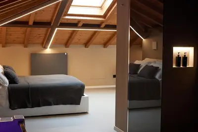 Letto o letti in una camera di Rooms Don Alfonso