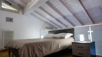 Letto o letti in una camera di Residenze Umberto I