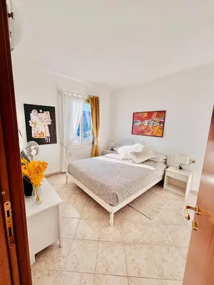 Letto o letti in una camera di Appartamento Moneglia Holidays