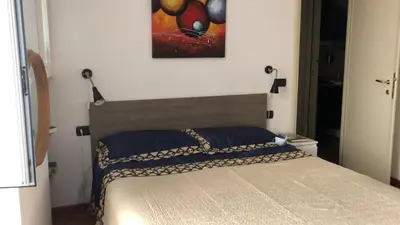 Letto o letti in una camera di Chiavari Centro