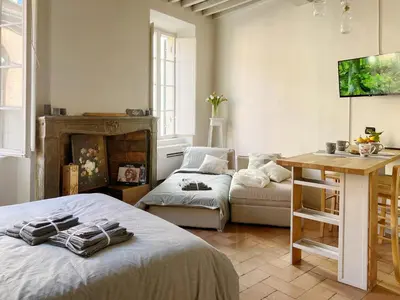 Letto o letti in una camera di Lovely nest in Parma centro