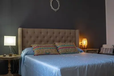 Letto o letti in una camera di 4 Passi dal Centro