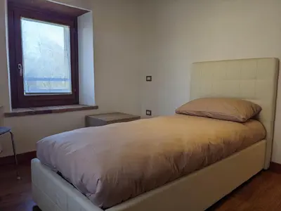 Letto o letti in una camera di Casa Stella vicinanze Maranello