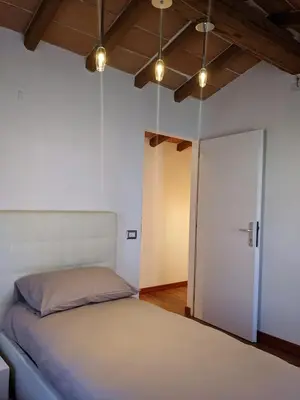 Letto o letti in una camera di Casa Stella vicinanze Maranello