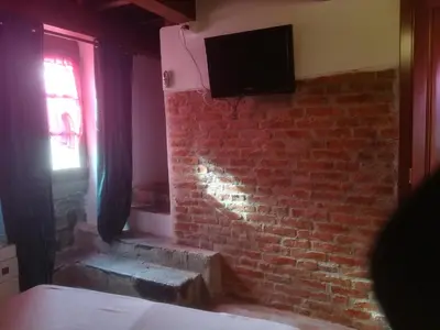 Letto o letti in una camera di casa del vicolo verde