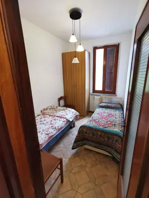 Letto o letti in una camera di Appartamento Lucia