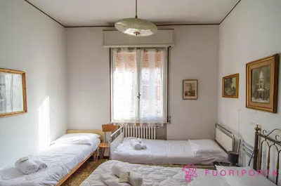 Letto o letti in una camera di FuoriPorta Affitti Brevi - Incantevole Residenza Retro