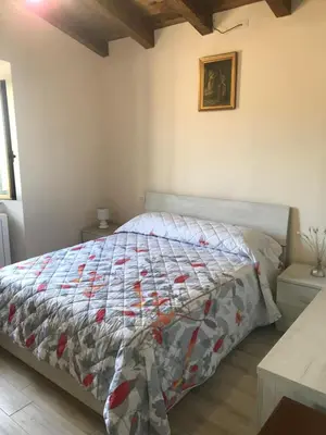 Letto o letti in una camera di La casa dei quadri
