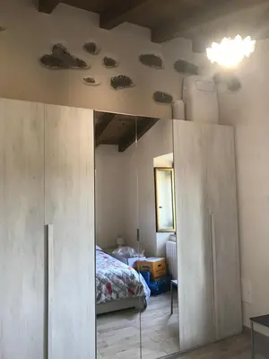Letto o letti in una camera di La casa dei quadri