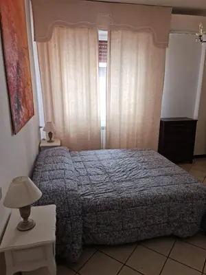 Letto o letti in una camera di Maia Incantevole