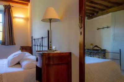 Letto o letti in una camera di Agriturismo I Giunchi