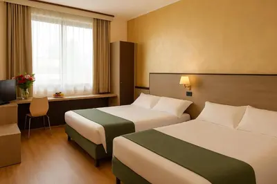 Letto o letti in una camera di Airone Hotel