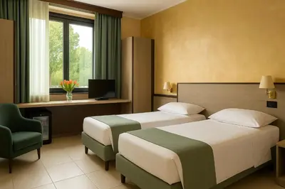 Letto o letti in una camera di Airone Hotel