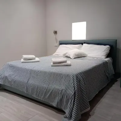 Letto o letti in una camera di Casa Isabella De Luxe Studio
