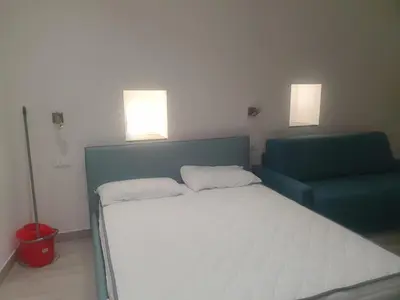Letto o letti in una camera di Casa Isabella De Luxe Studio