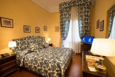 Letto o letti in una camera di Hotel Posta