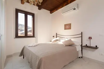 Letto o letti in una camera di Villa with private pool Fivizzano 9 by VacaVilla