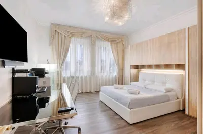 Letto o letti in una camera di Residenza Tosca