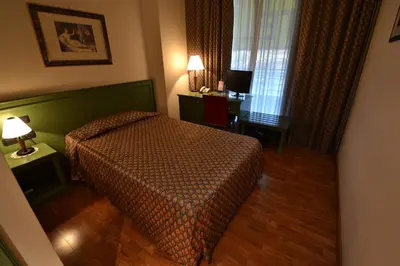 Letto o letti in una camera di Sun Hotel