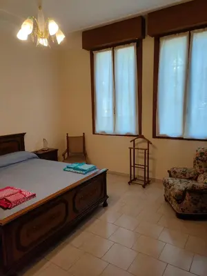 Letto o letti in una camera di Casa Timoteo