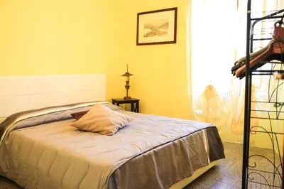 Letto o letti in una camera di Ca' Toni d'sovra