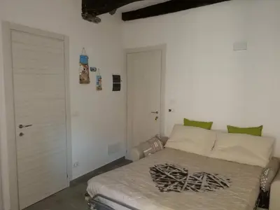 Letto o letti in una camera di La Terrazza sul Mare [ ☆☆☆☆☆ ] Monterosso