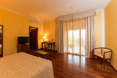 Letto o letti in una camera di Hotel Conteverde