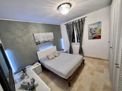 Letto o letti in una camera di Villa San Cataldo