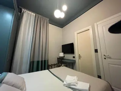 Letto o letti in una camera di Villa Margherita