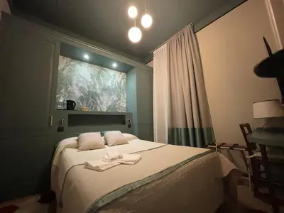 Letto o letti in una camera di Villa Margherita