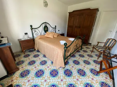 Letto o letti in una camera di Villa Margherita
