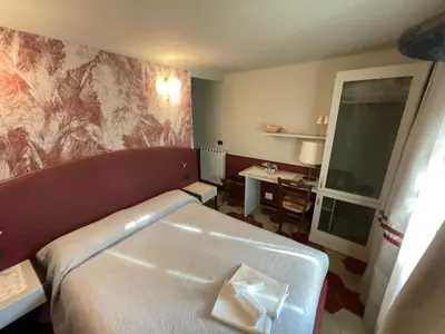 Letto o letti in una camera di Villa Margherita