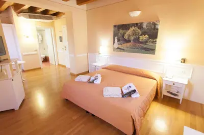 Letto o letti in una camera di Casa Romagnosi