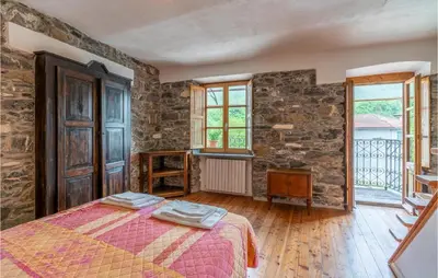 Letto o letti in una camera di Amazing Home In Loco Di Rovegno