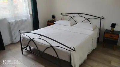 Letto o letti in una camera di L'Uliveto