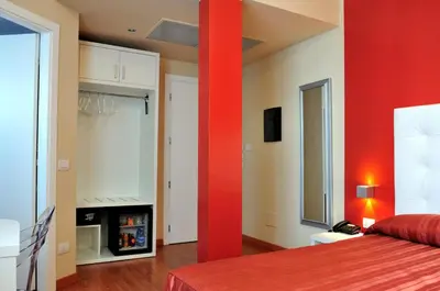 Letto o letti in una camera di Hotel Villa Molinari