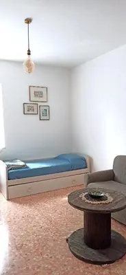 Letto o letti in una camera di La piazzetta di Gra e Baldo