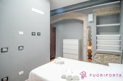 Letto o letti in una camera di FuoriPorta Affitti Brevi - Bixio 45